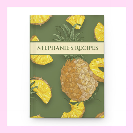 Olive-green pineapple-themed recipe journal with a personalized front cover, Stephanie's Recipes.