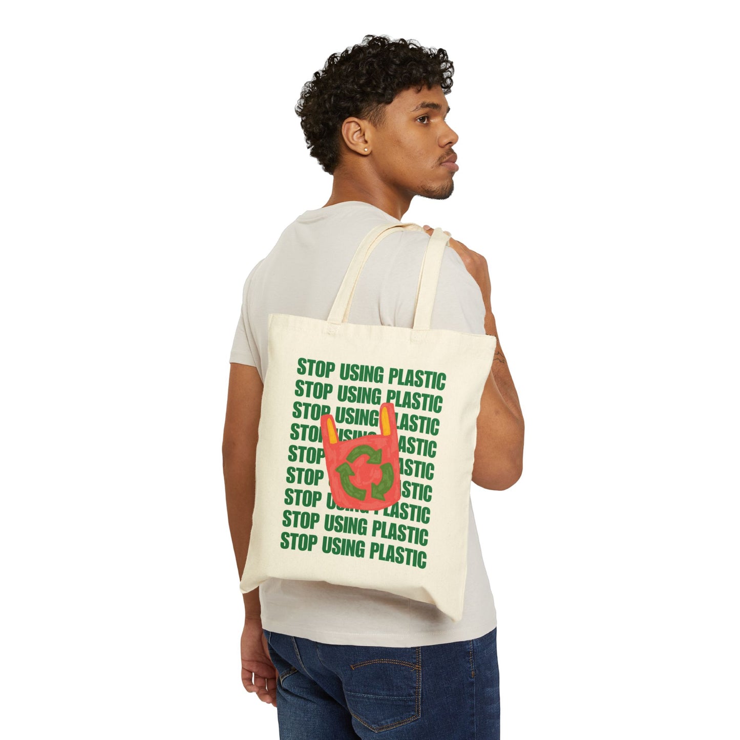 Person holding a tote bag with a frog design and 'Toad Sage' text on a white background