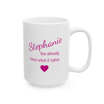 White mug with pink text and heart design on a white background
