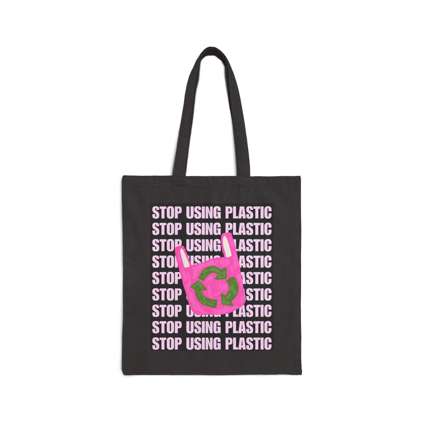 A black canvas tote bag with long black handles, featuring a graphic print of the word 'STOP' in light pink text repeated vertically, overlaid with a bright pink recycling symbol with green arrows.